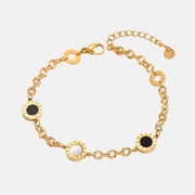 Pulsera de acero inoxidable con conchas y números romanos