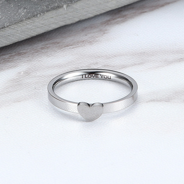 Bague de couple creuse en acier inoxydable en forme de coeur